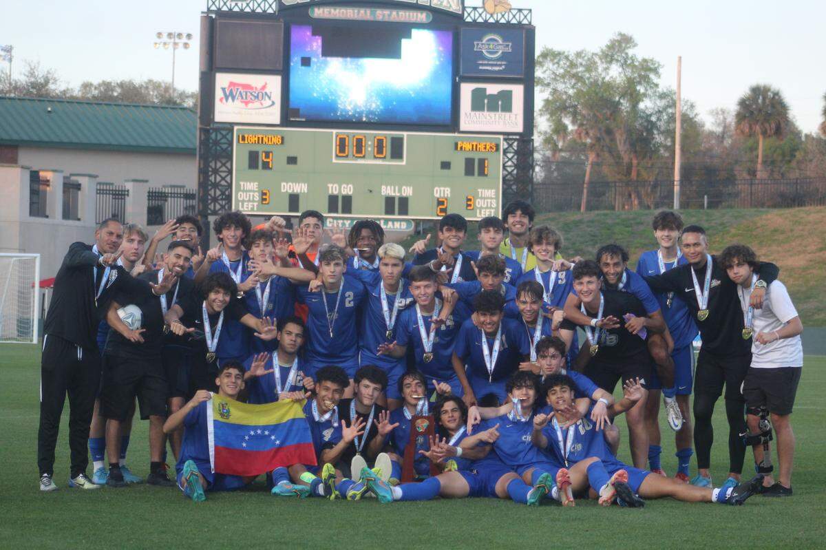 Cypress Bay’s boys soccer players and coaches celebrate their first state championship since 2017 and sixth overall for its program following a 4-1 win over Tampa Plant.