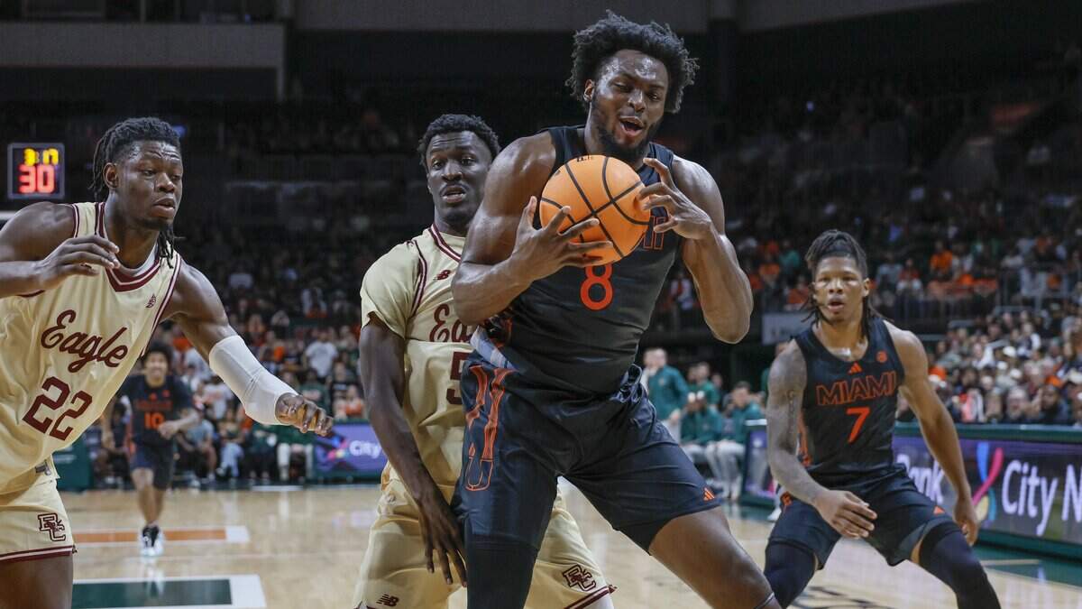 Miami Hurricanes center Ernest Udeh Jr. (8) grabs a rebound against the Boston College Eagles in the first half at the University of Miami's Watsco Center in Coral Gables, Florida, on Saturday, February 28, 2026.