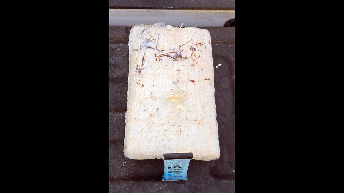 A brick of cocaine found on the shore in the Florida Keys Sunday, April 27, 2025, is displayed by the Monroe County Sheriff’s Office.