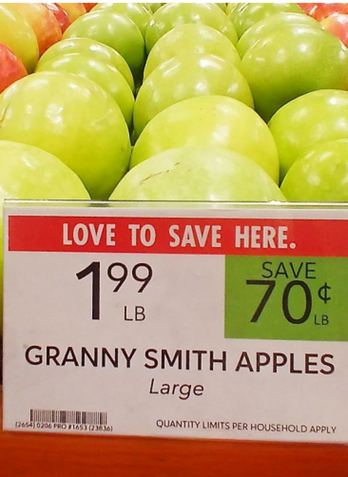 Granny Smith apples marked as being on sale for $1.99 per pound at Publix. Wendy Koutouzis’ lawsuit claims this was an old sale price at 4900 Kennedy Blvd. in Tampa, and she was charged the regular price when checking out.