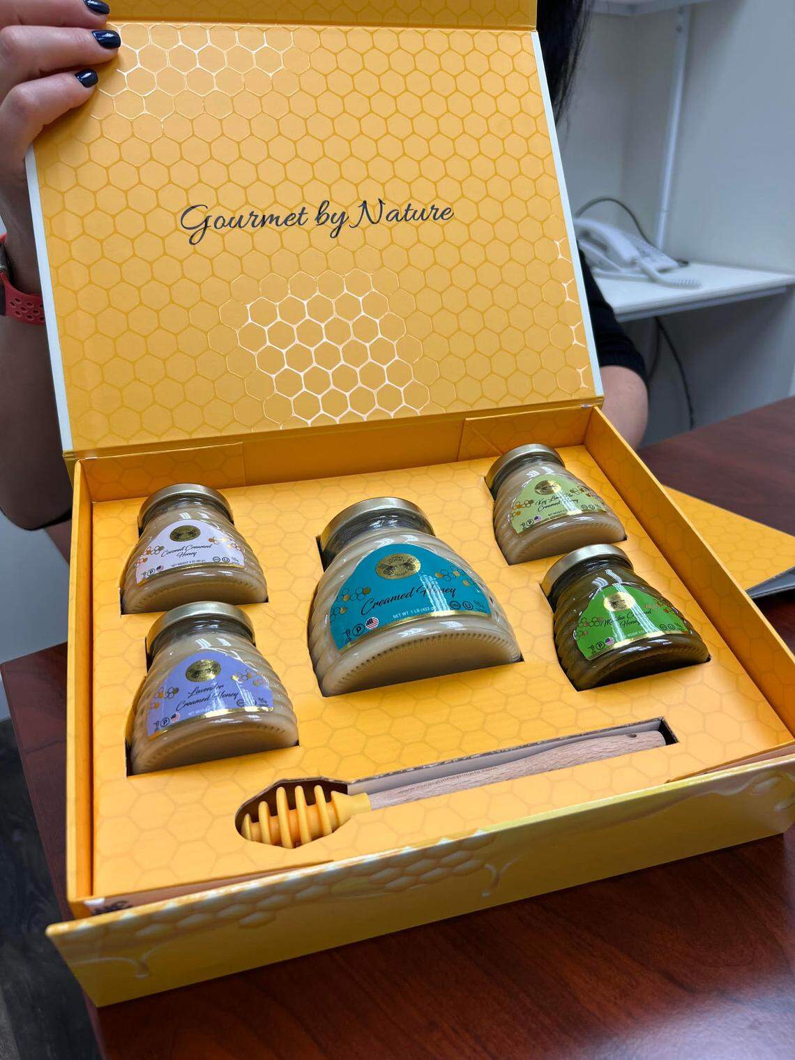 A packaged set of Sunny Honey Miami products.