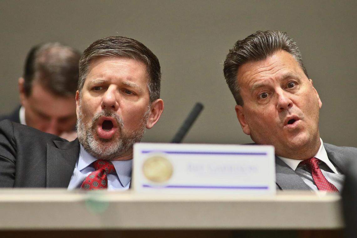 Rep. Sam Garrison, R-Fleming Island, and Rep. Fred Hawkins, R-St. Cloud, voice a “No” vote to an amendment on a bill about migrant transportation during an Appropriations Committee meeting, Monday, Feb. 6, 2023, in the Knott Building at the Capitol in Tallahassee, Fla.