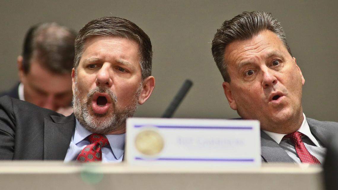 Rep. Sam Garrison, R-Fleming Island, and Rep. Fred Hawkins, R-St. Cloud, voice a “No” vote to an amendment on a bill about migrant transportation during an Appropriations Committee meeting, Monday, Feb. 6, 2023, at the Capitol in Tallahassee. Florida legislators were meeting in a special session to take up a list of issues proposed by Gov. Ron DeSantis. 