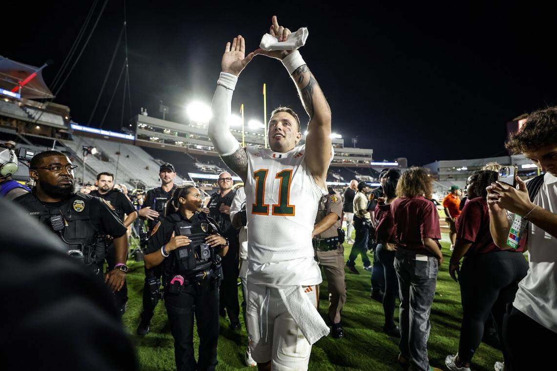 Miami Hurricanes quarterback Carson Beck (11) flashes the U after the Hurricanes defeat the Florida State Seminoles during their NCAA game at Doak Campbell Stadium in Tallahassee, Florida, on Saturday, October 4, 2025.