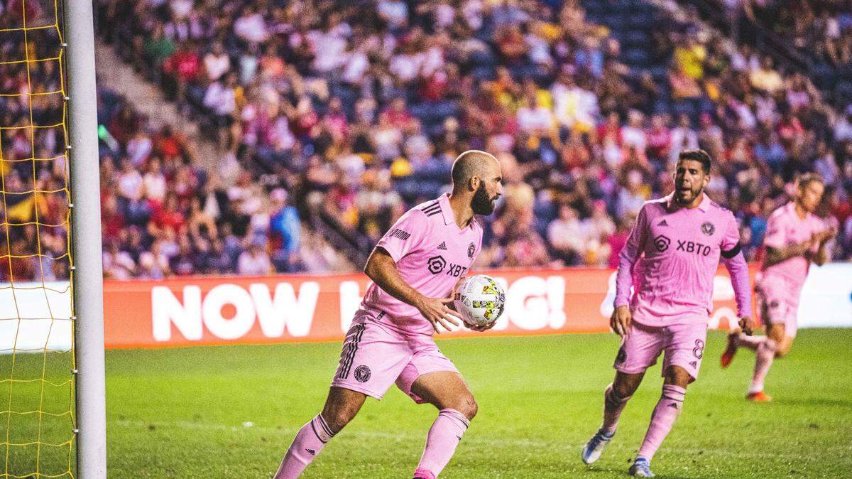 Inter Miami forward Gonzalo Higuain retrieves the ball after scoring a penalty kick in the 77th minute in a 3-1 road loss against the Chicago Fire on Sept. 10, 2022.