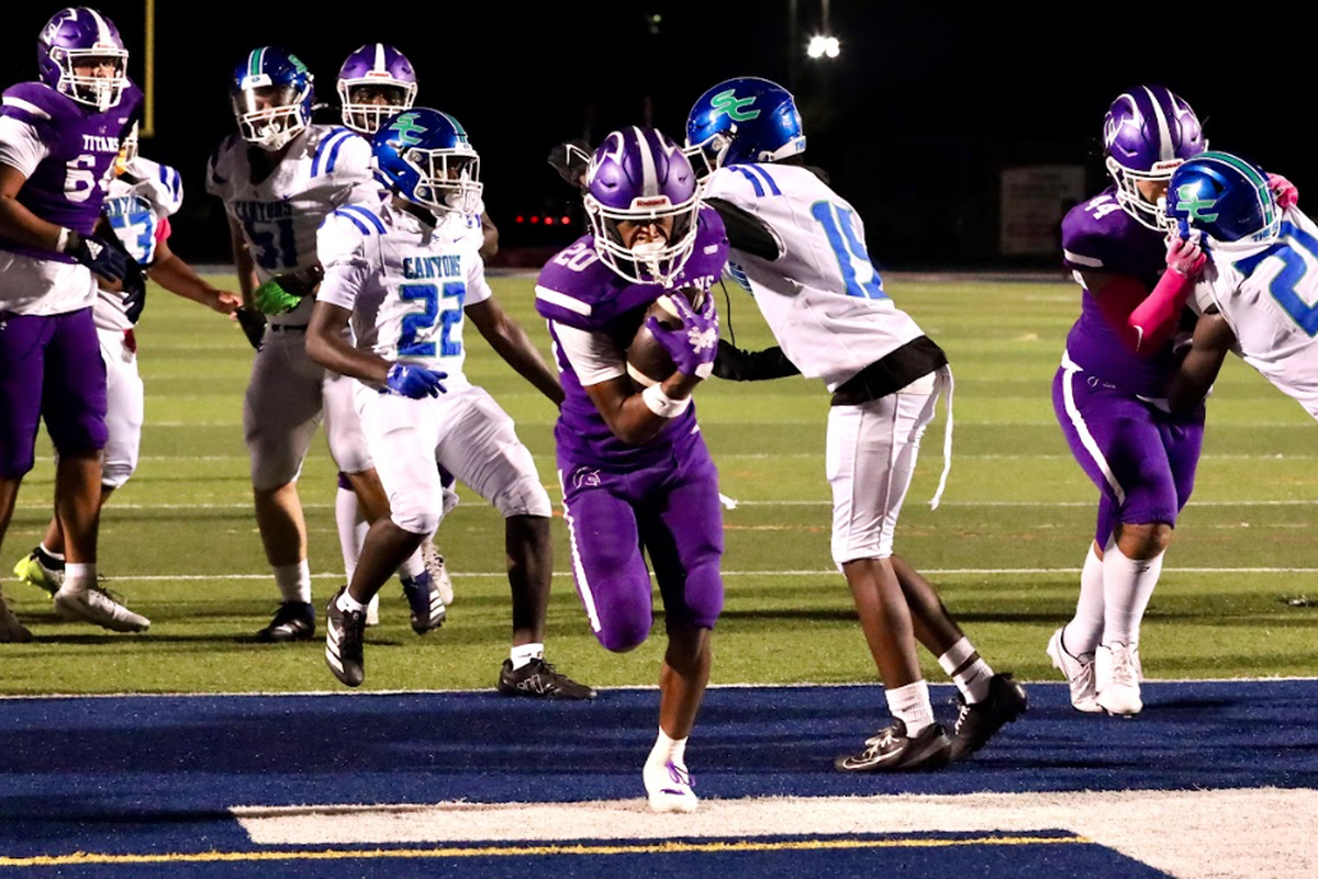 Gregory Florence scores a 5-yard touchdown run during True North’s 42-0 win over Boynton Beach Somerset Canyons at Tropical Park on Oct. 17, 2025.