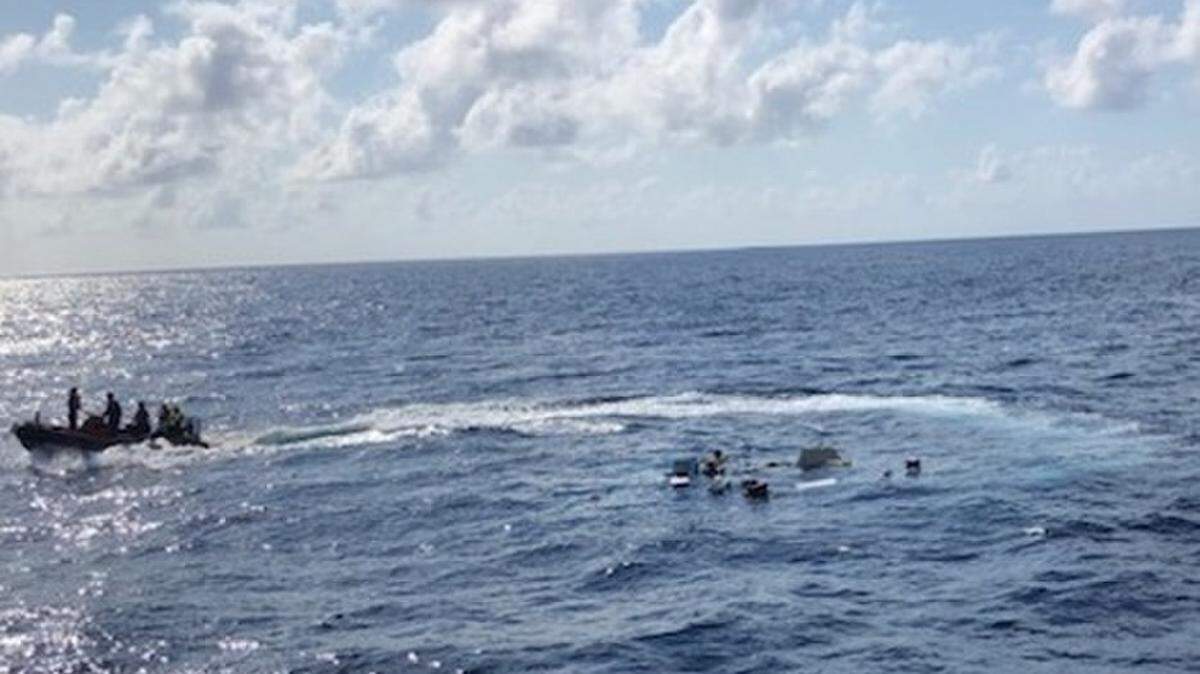 Coast Guard Cutter Cohito rescues six from a sinking boat off Sunny Isles Beach, Florida, on April 6, 2019.