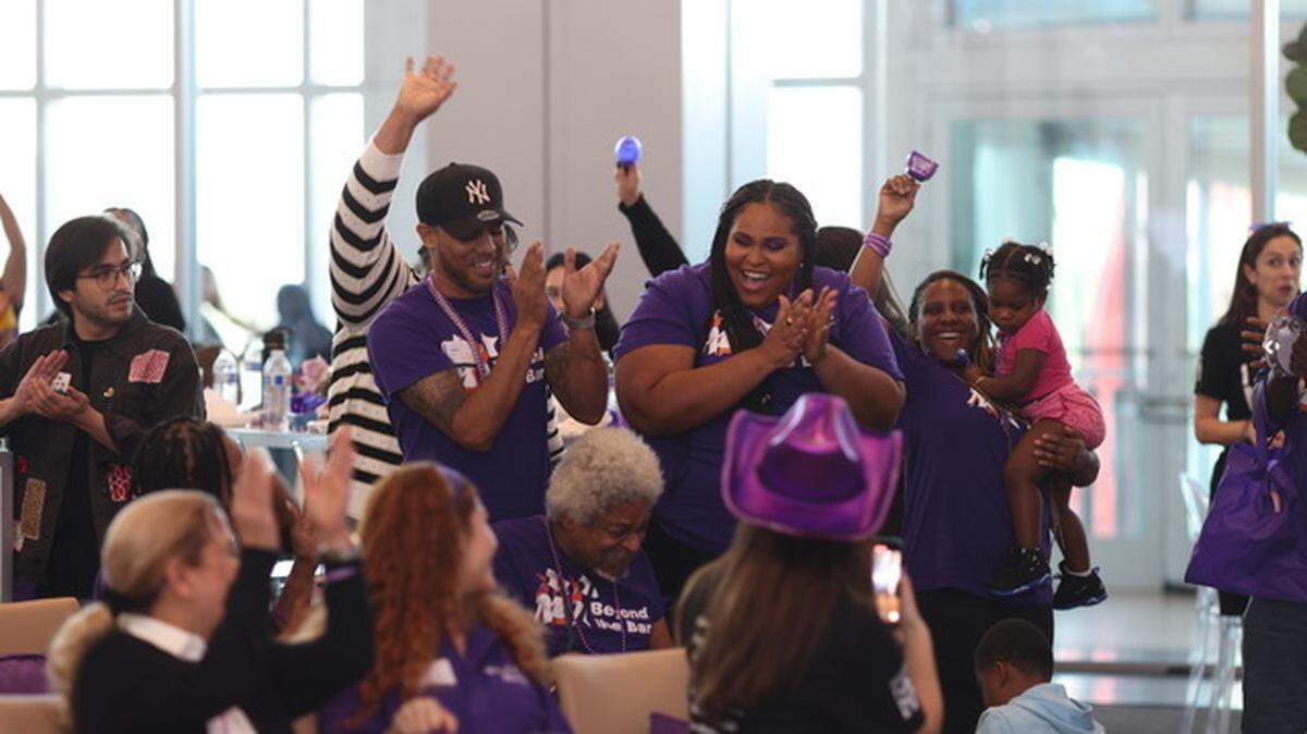 Community members cheer during Give Miami Day.
