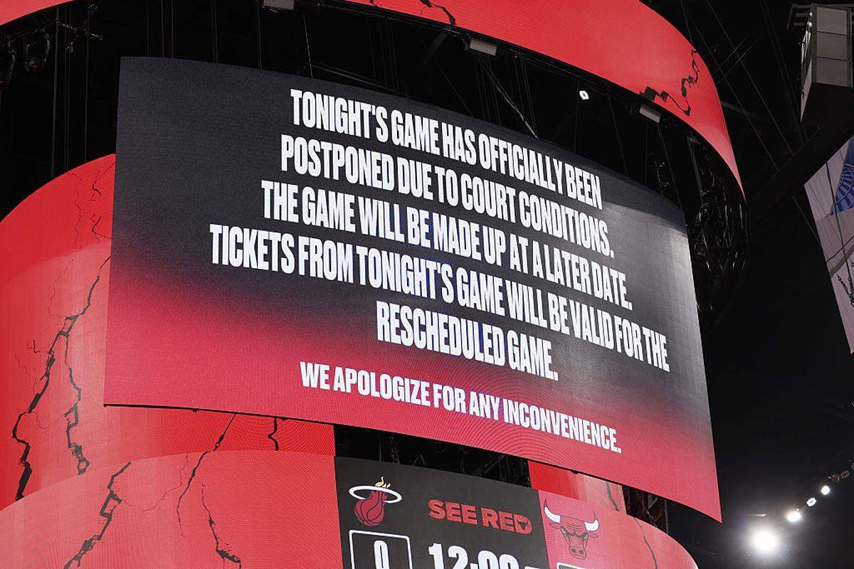 A view of a post made by the Chicago Bulls organization on the Jumbotron to notify fans that the game against the Miami Heat has been postponed at the United Center due to court conditions on January 8, 2026 in Chicago.