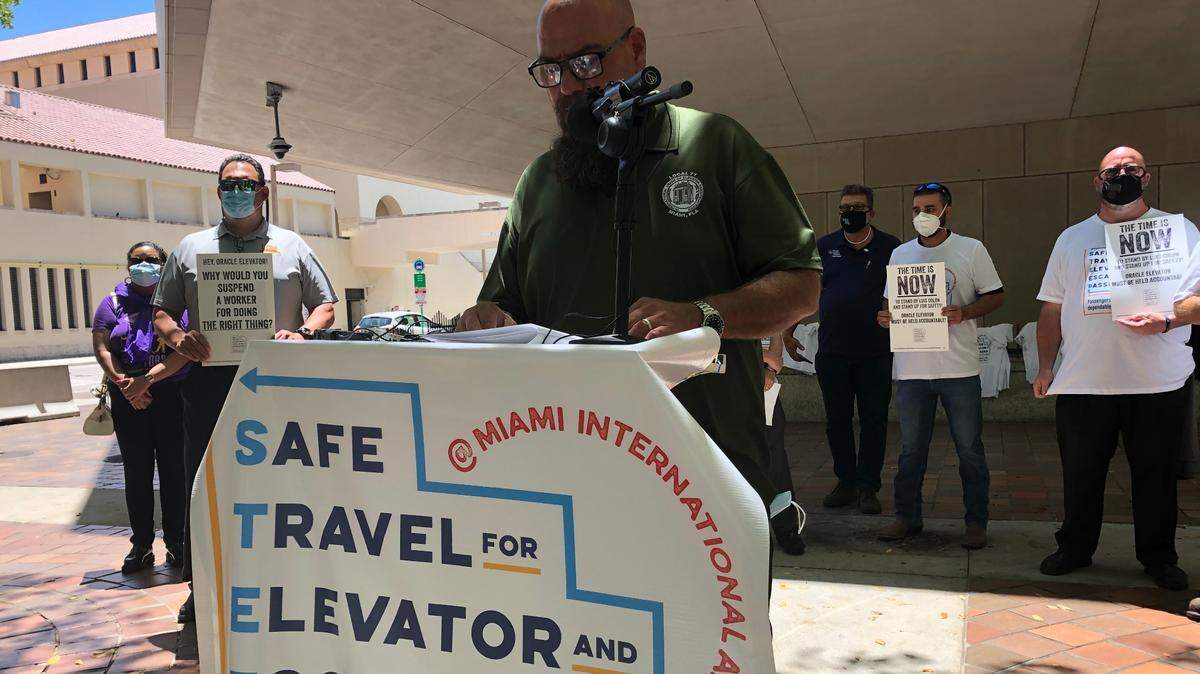 Greg Levenson, vice president of the Local 71 chapter of the International Union of Elevator Constructors, speaks at a press conference on Tuesday, May 11, 2021, accusing Oracle Elevators of safety failures at Miami International Airport. Oracle denies wrongdoing.
