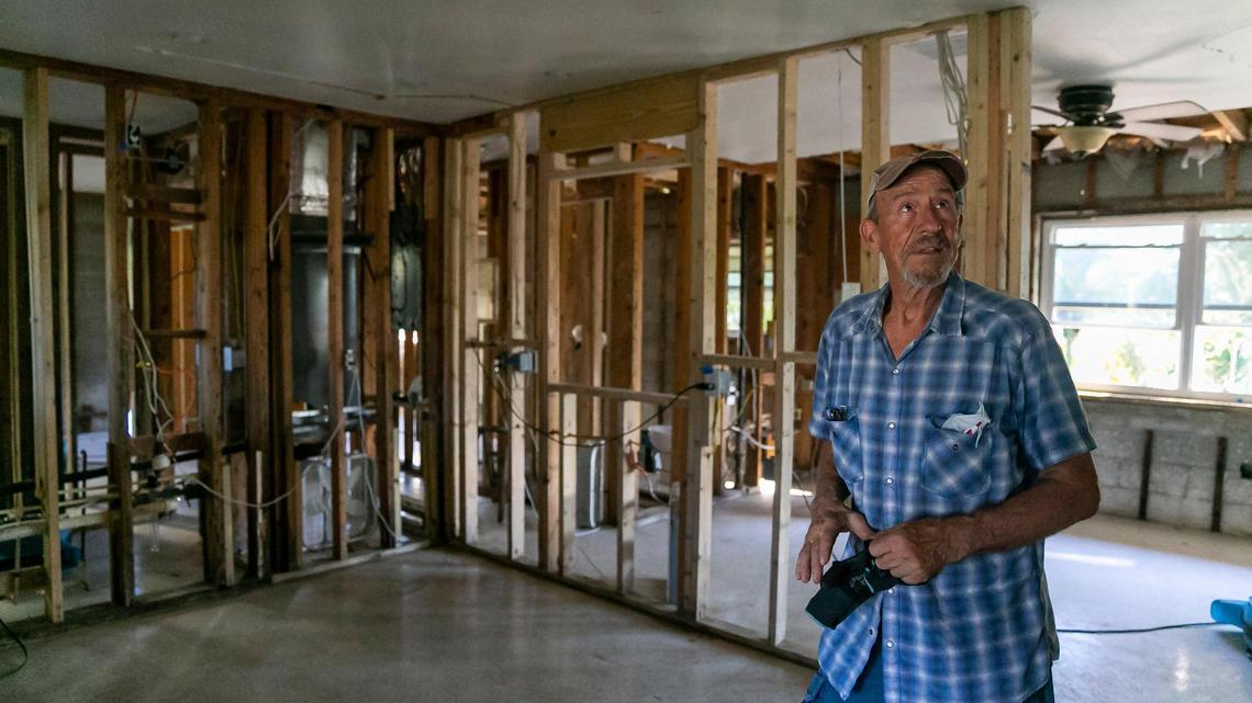 Chuck, 72, gives a tour of his Hurricane Ian-damaged home on Tuesday, Oct. 18, 2022, in Bonita Shores, Fla.