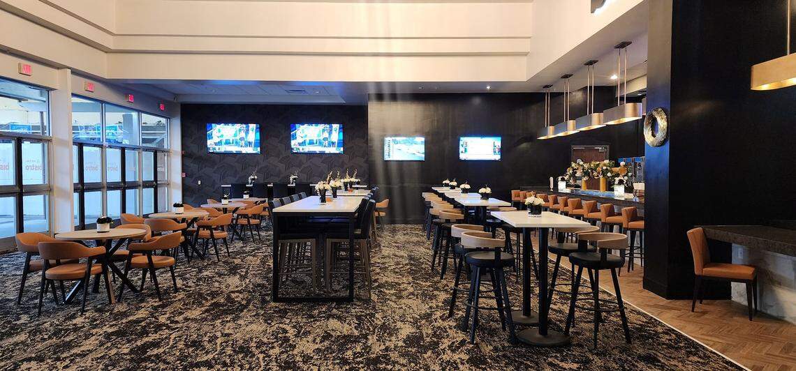 The modern lounge area at the new Regal Bistro movie theater at The Falls serves as a communal pre- and post-movie hub for guests to congregate, Regal said in a statement. The new bar offers a selection of 24 beers on tap, including a few local craft labels. The lounge is also surrounded by large-screen televisions tuned into current non-cinema entertainment. Regal announced the opening on Dec. 17, 2025.