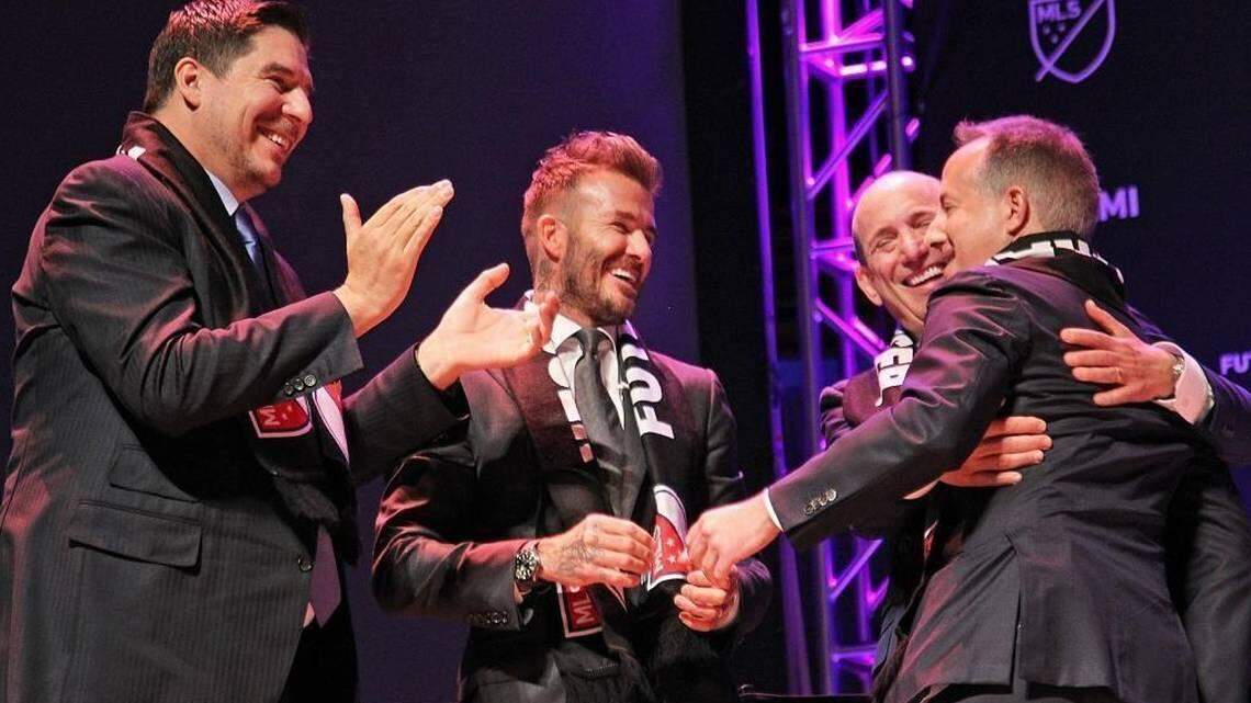 Major League Soccer commissioner Don Garber (second from right) congratulates Inter Miami owners Jorge Mas (right), Marcelo Claure (left), and David Beckham (second from right) when the team was awarded in January 2018.
