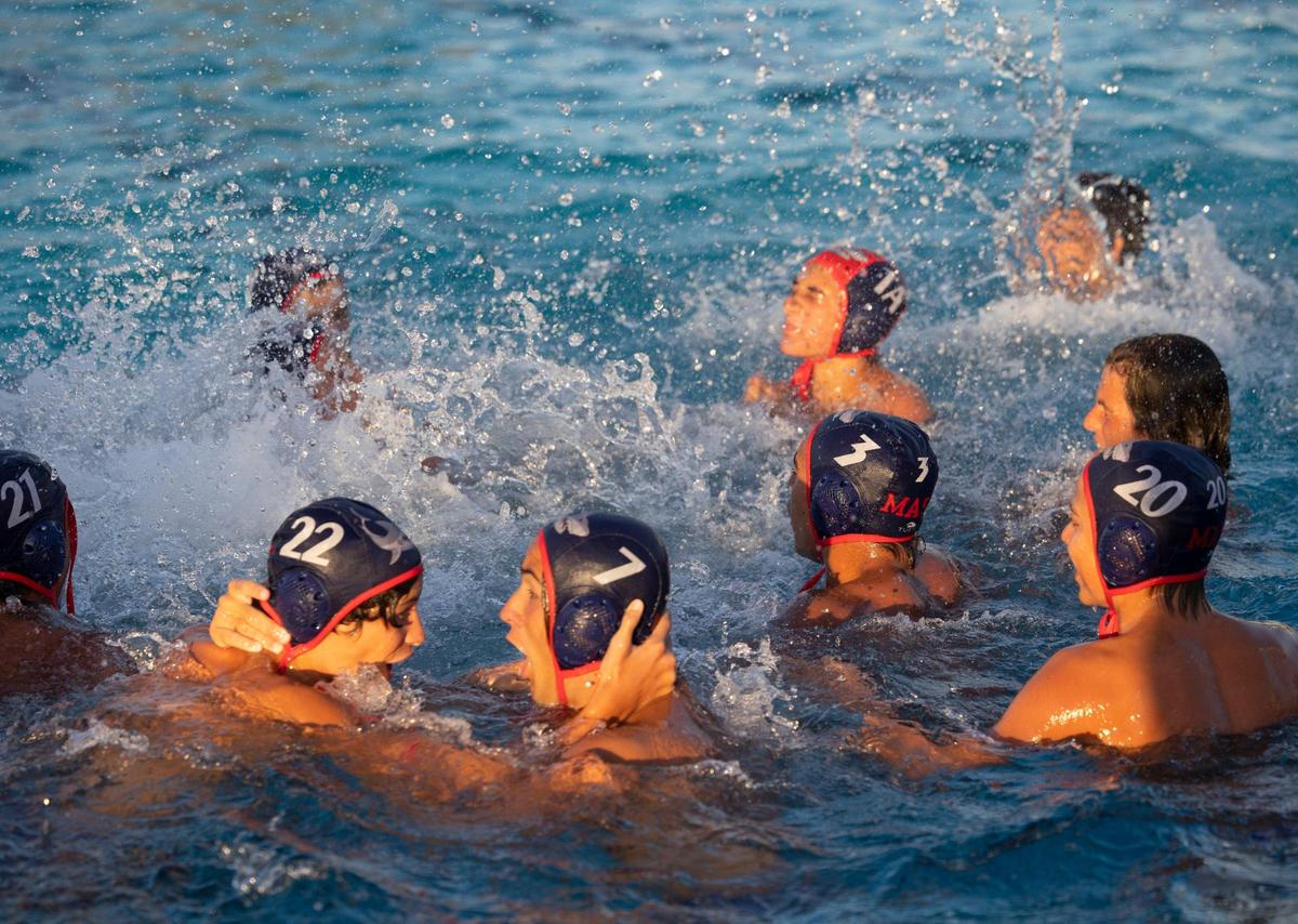MAST players celebrate their win after the GMAC boys water polo finals against Columbus on Wednesday, March 20, 2024, at MAST Academy on Virginia Key.