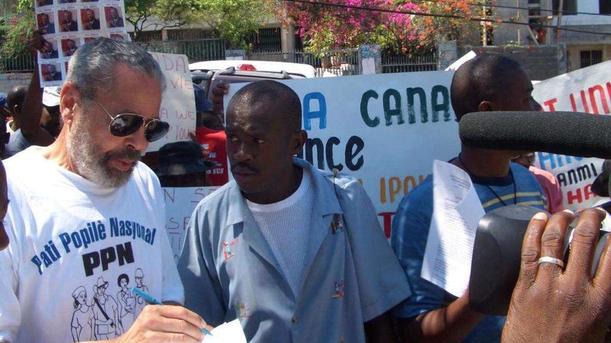 Ben Dupuy, left, the firebrand Haitian political activist who became the voice of the radical opposition at home and abroad, died on Sunday, April 23, 2023, in Miami Beach. He was 91.