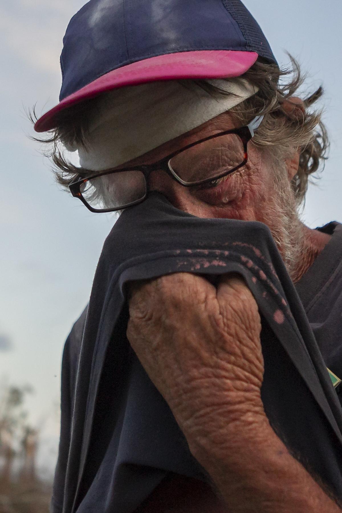 Mickey Fox, 61, wipes a tear from his face in Callaway, Florida, on Saturday, Oct. 20, 2018. He survived Hurricane Michael with his wife in a trailer that collapsed on top of them. The storm devastated the area in the Florida Panhandle.