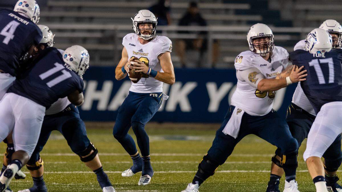 FIU Panthers quarterback James Morgan (12) looks for an open receiver against the Old Dominion Monarchs during the Saturday, Sept. 8, 2018 game held at Old Dominion University in Norfolk, Virginia. FIU defeated Old Dominion 28 to 20.
