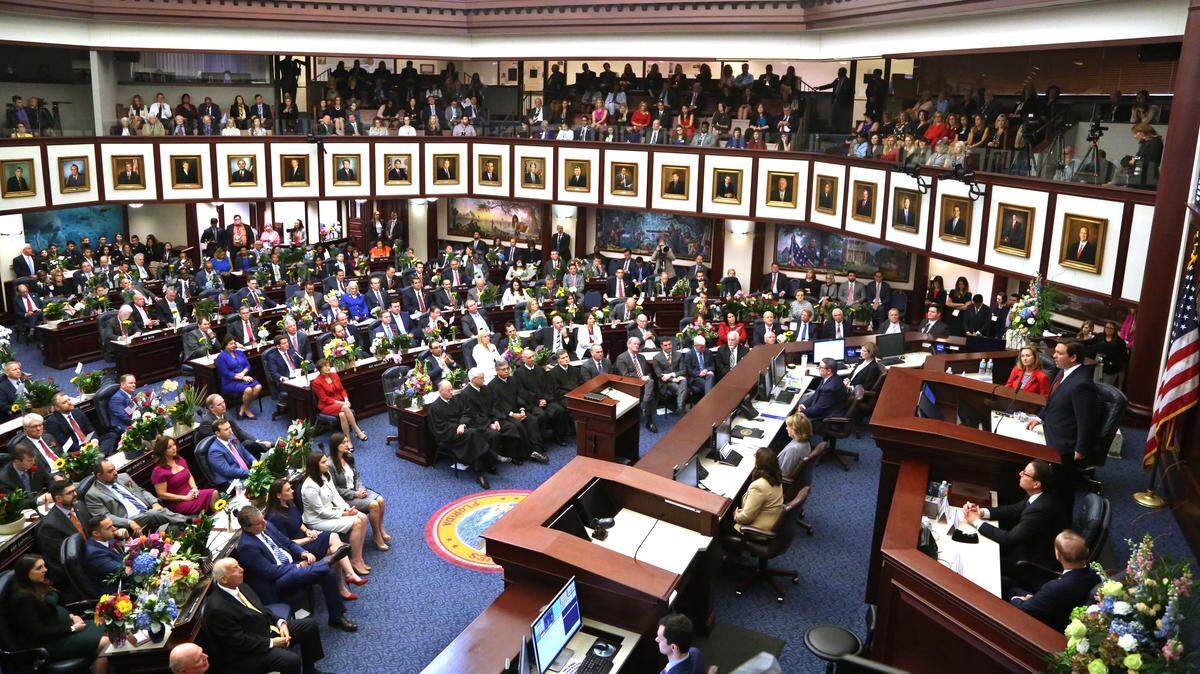 Florida Governor Ron DeSantis, right, addresses a joint session of the Florida Legislature, Tuesday, January 14, 2020 during his State of the State address in Tallahassee.