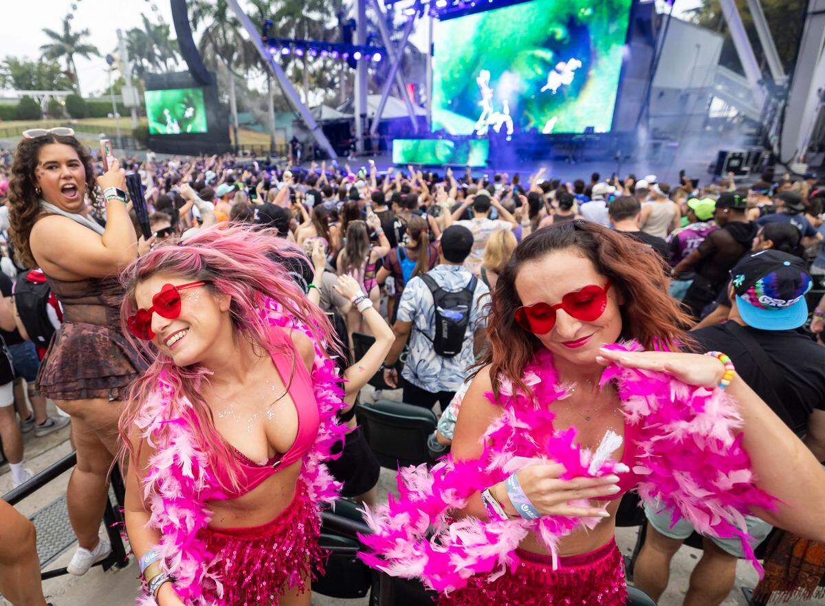 Nicola, left, and Maggie dance as Becky Hill performs during Ultra Music Festival’s 25th anniversary at Bayfront Park on Saturday, March 29, 2025, in downtown Miami, Fla.