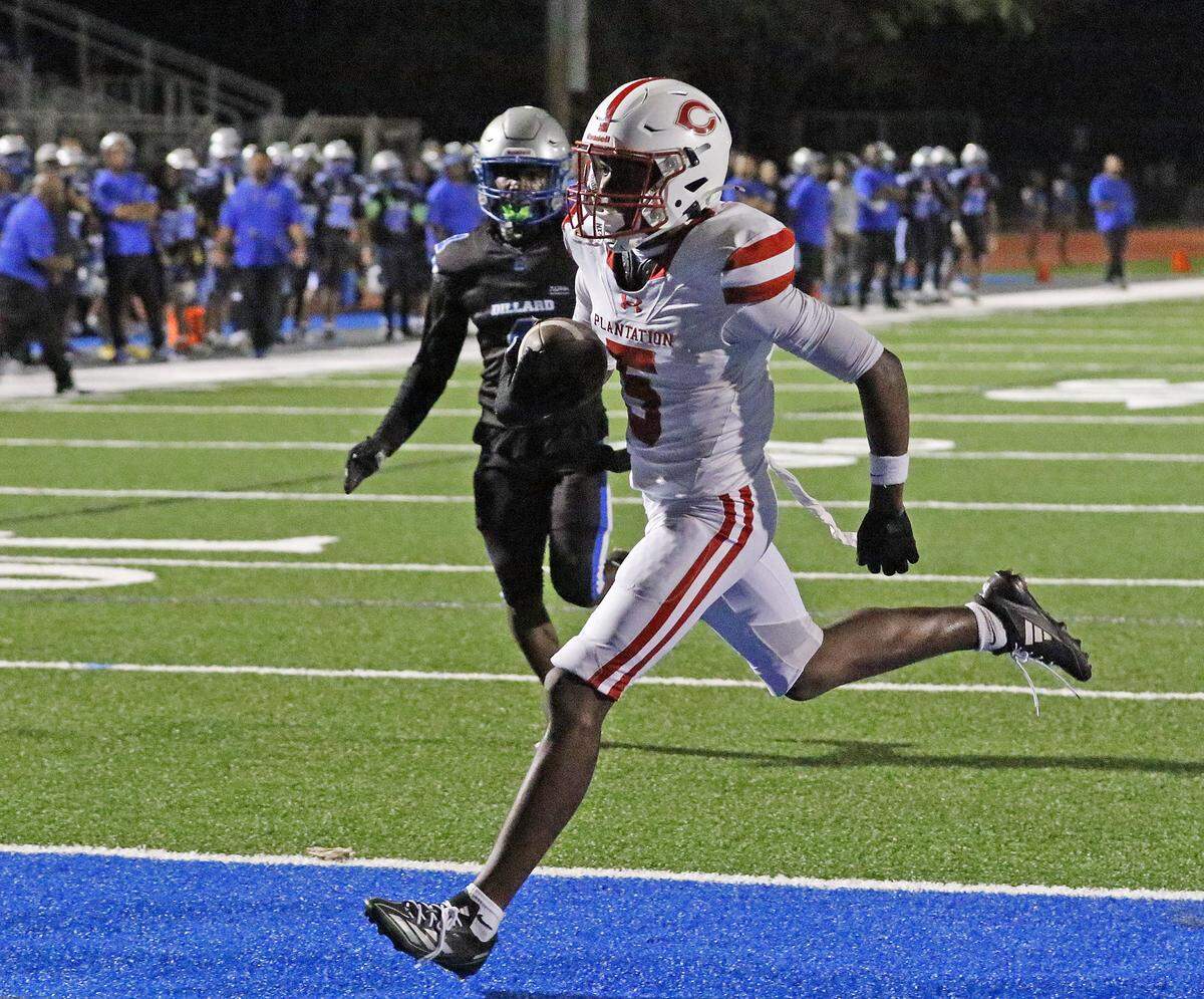 Plantation Colonels wide receiver Desmond Christian (5) scores a touchdown against Dillard Panthers during Region 4-4A quarterfinal football game on Friday, November 14, 2025 at Otis Gray Jr. Memorial Stadium in Fort Lauderdale. Andrew Uloza / for Miami Herald