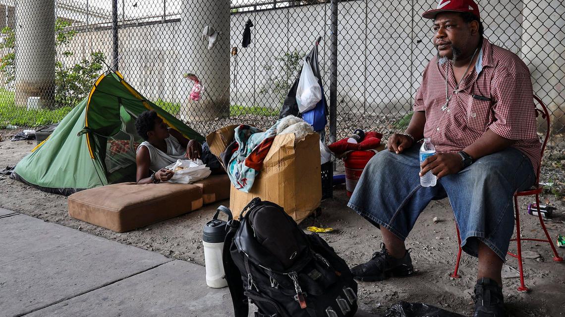 Veggeta Muhammad, 41, right, has been homeless for six months and claims that the police and the Homeless Trust discarded dwellers’ items in an attempt to evict many who sheltered in place underneath I-95.