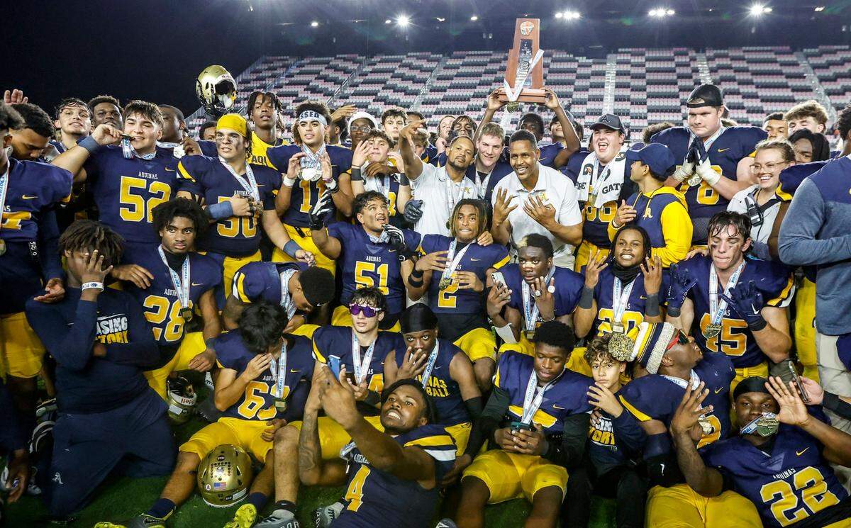 St. Thomas Aquinas football team celebrates defeating the Homestead Broncos during the 2022 FHSAA State Championships-Class 3M at DRV PNK Stadium in Ft. Lauderdale on Thursday, December 15, 2022.