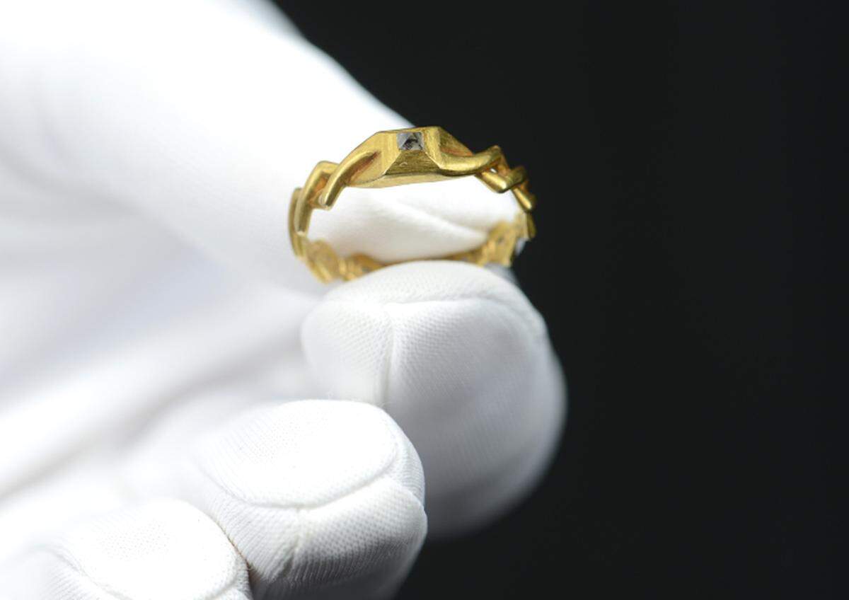 An expert displays the medieval ring.