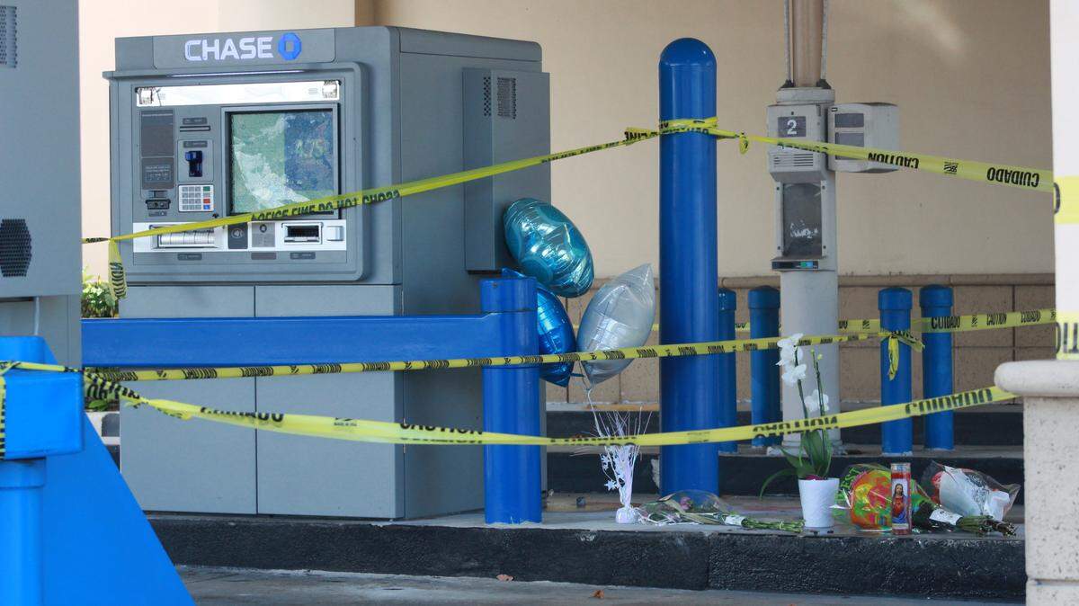 A memorial was created at a West Kendall Chase Bank where two adults and a child were killed in a murder-suicide.