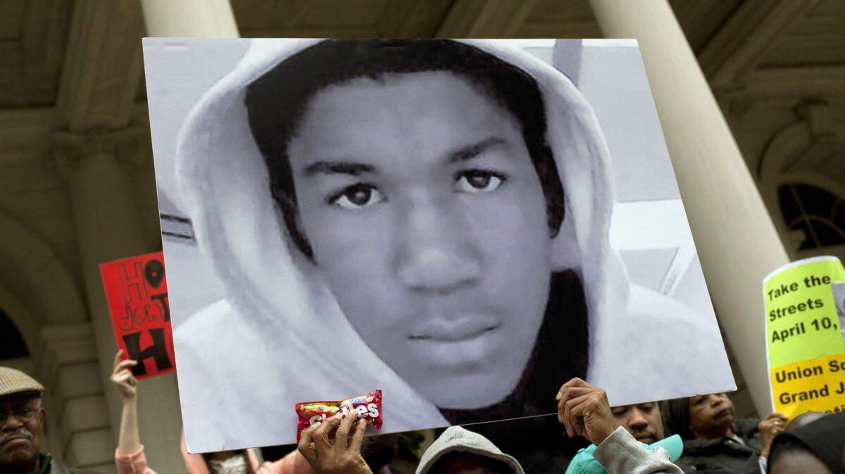 In March 2012, New Yorkers attend a press conference at City Hall, calling for justice in killing of 17-year-old Trayvon Martin, shot to death in Sanford, Florida.