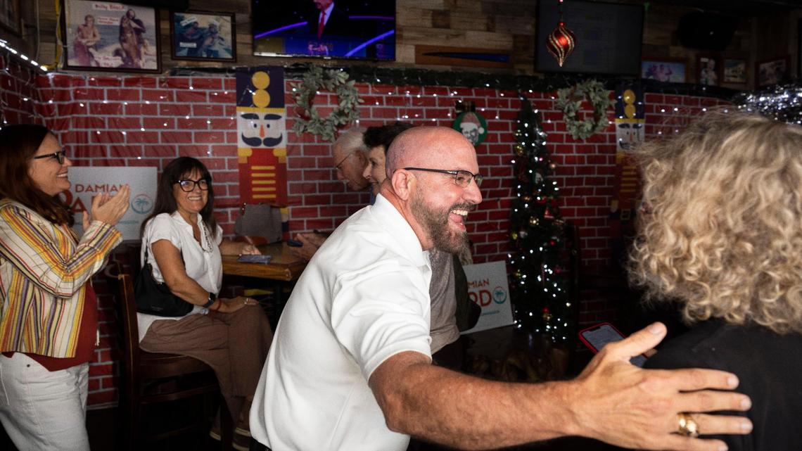 Damian Pardo arrives to his watch party on Tuesday, Nov. 7, 2023, at Flanigan’s on Bird Ave. Pardo and incumbent Commissioner Sabina Covo will be in a runoff election.