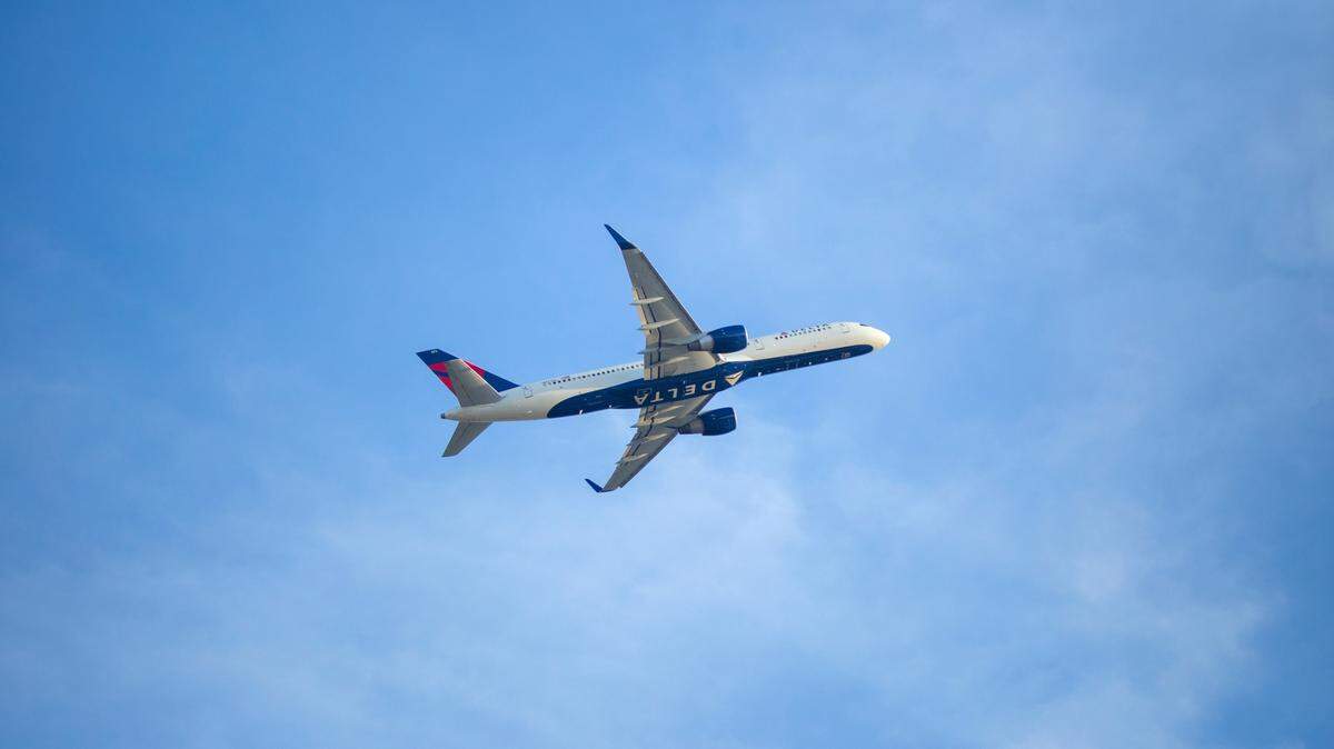 An international flight bound for Barcelona. Spain, turned around and returned to Atlanta after diarrhea was spread through the plane by a passenger, a Delta pilot said.