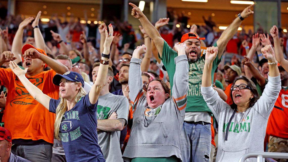 Miami Hurricanes fans scream as the Canes intercept the ball in the fourth quarter against Notre Dame at Hard Rock Stadium in Miami Gardens, Florida, November 11, 2017.