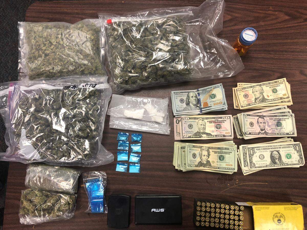 Cocaine, marijuana and cash seized at the home of Jamie Green, a security guard at Felix Varela High in West Kendall. He is accused of drug dealing during school hours.