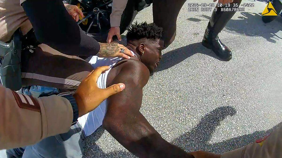 Photo captured from the Miami-Dade police body camera footage of its officers’ controversial Sunday, Sept. 8, 2024, traffic stop of Miami Dolphins star wide receiver Tyreek Hill.