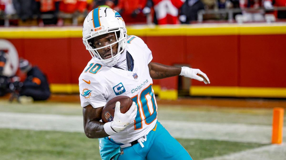 Miami Dolphins wide receiver Tyreek Hill (10) scores in the second quarter against the Kansas City Chiefs at GEHA Field at Arrowhead Stadium in Kansas City, Missouri, on Saturday, January 13, 2024.
