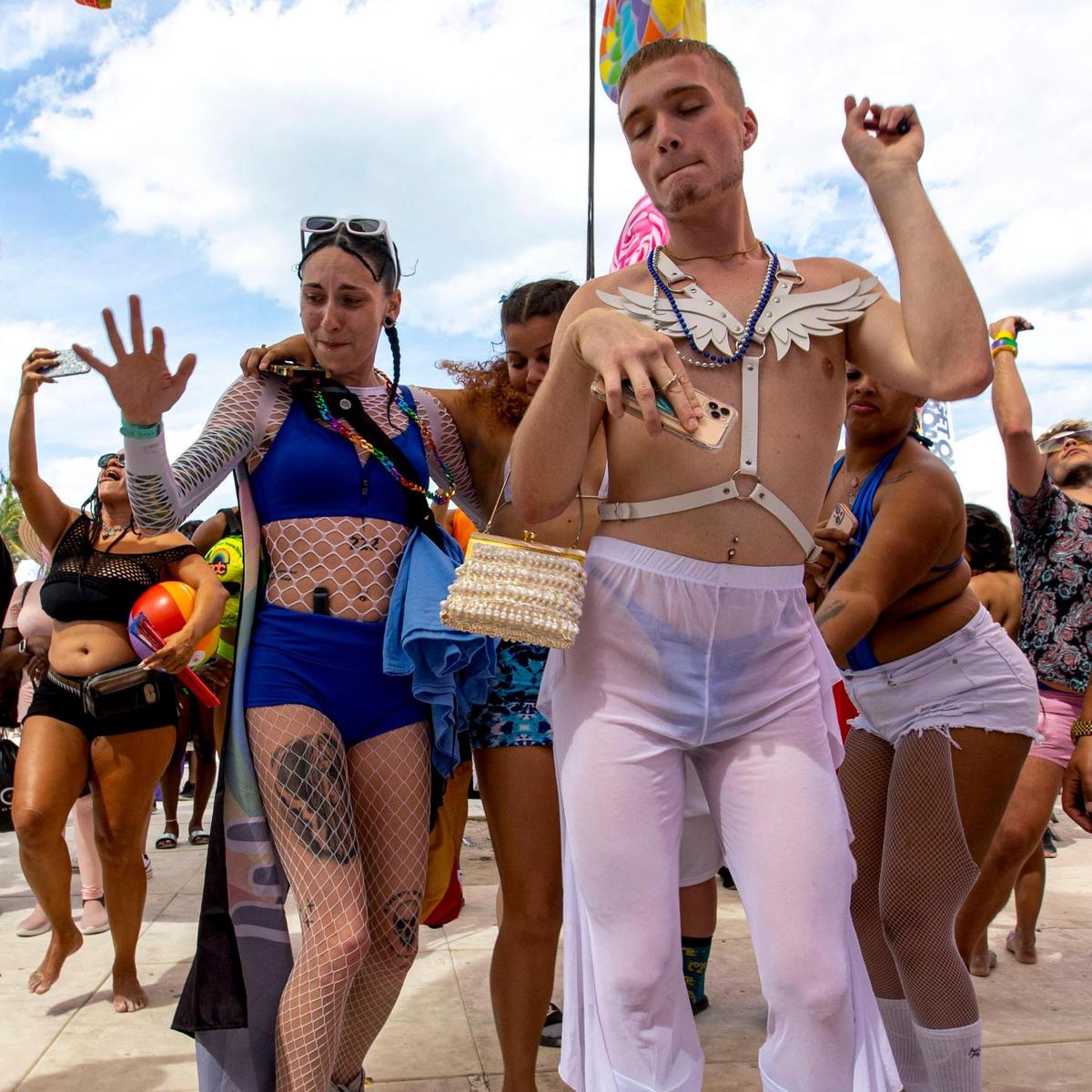 Crowds dance to musical performances on Celebrity Cruises Stage during Miami Beach Pride Festival at Lummus Park in Miami Beach, Florida, on Saturday, April 9, 2022.