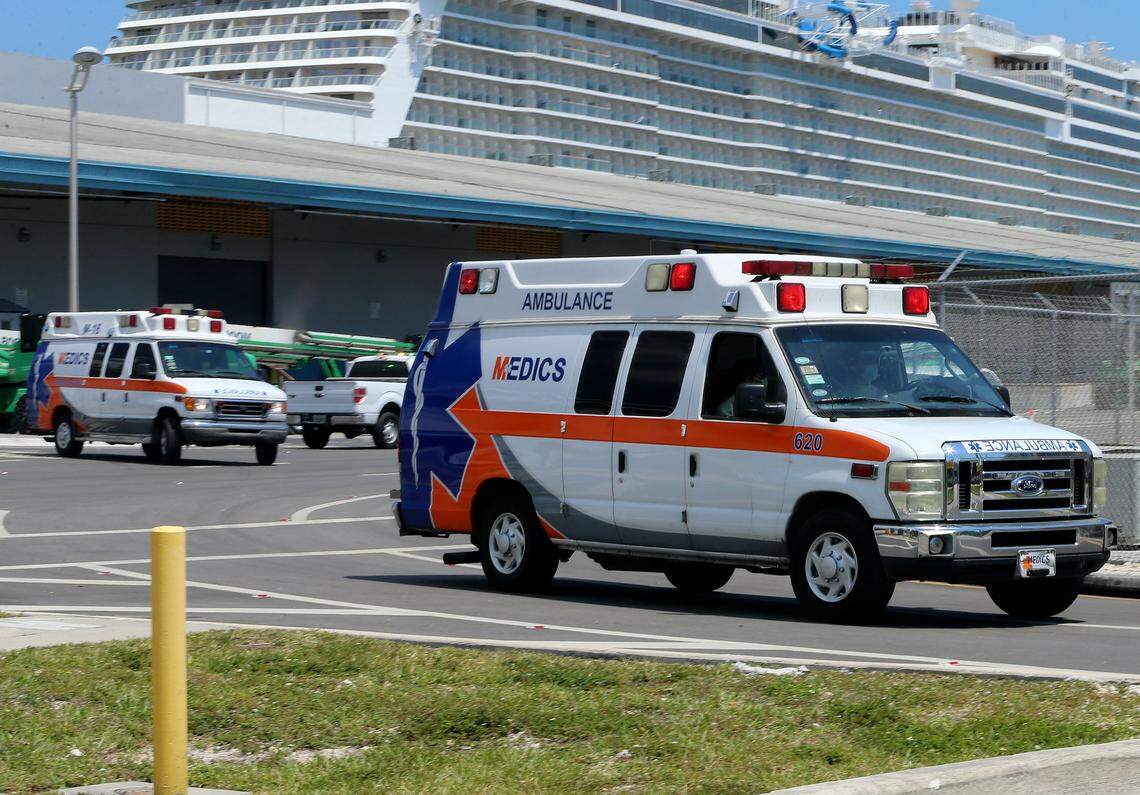 Ambulances are seen coming out of Terminal D after the Coral Princess cruise ship docked at PortMiami with several sick people on board on Saturday, April 4, 2020.