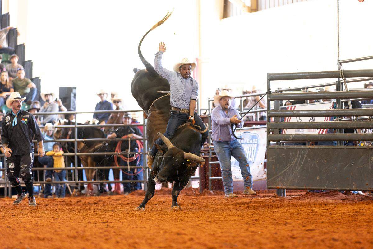 An unidentified cowboy rides a bull during the 2025 CountryFest event in Tropical Park. This photo was provided to Miami-Dade Commission Chairman Anthony Rodriguez’s office by event staff and released on July 24, 2025, as part of a public records request to the Miami Herald. 