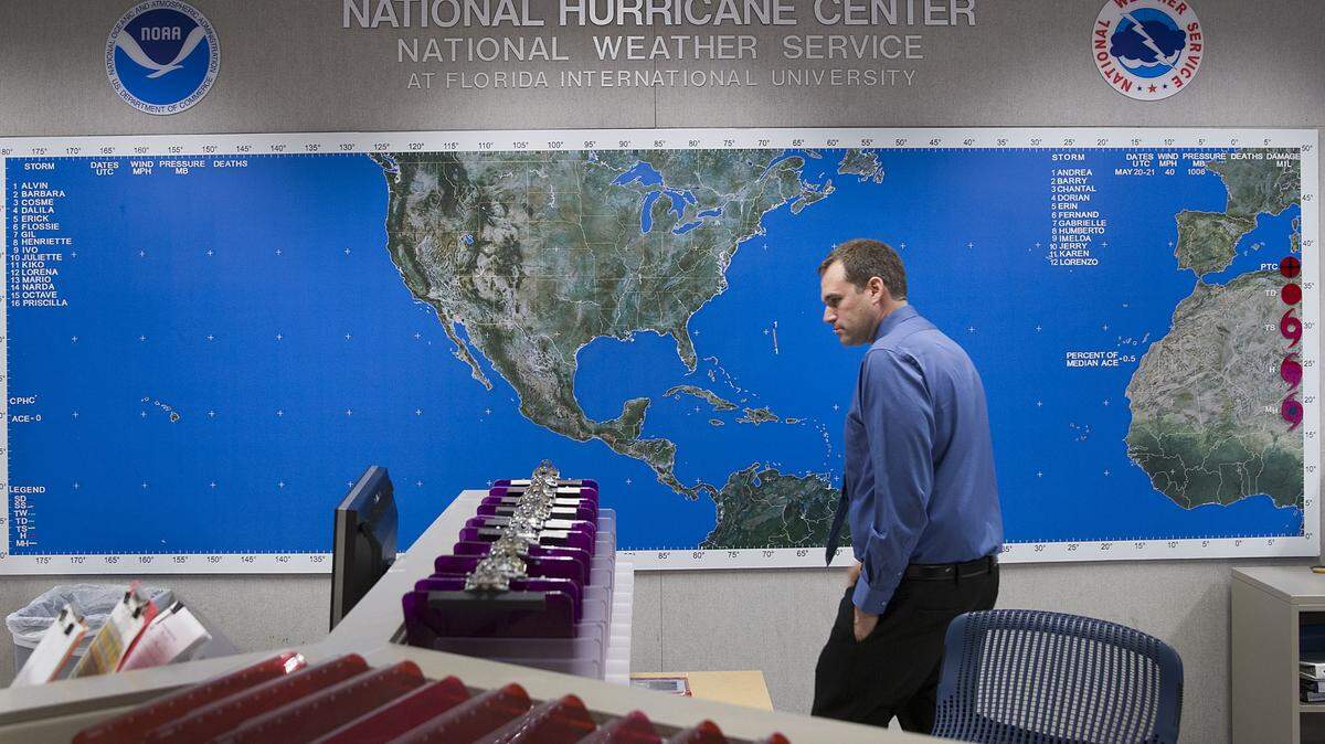 MIAMI, FLORIDA - MAY 31: Michael Brennan, Chief Hurricane Specialist Unit, walks past the hurricane tracking map at the NOAA NWS National Hurricane Center as the media is given a tour before the start of the Atlantic hurricane season on May 31, 2019 in Miami, Florida. With the 2019 hurricane season beginning on June 1, 2019 and ending on November 30, 2019 officials are encouraging people to make sure they are prepared for the season with supplies and plans in place in case a storm hits their area. (Photo by Joe Raedle/Getty Images)