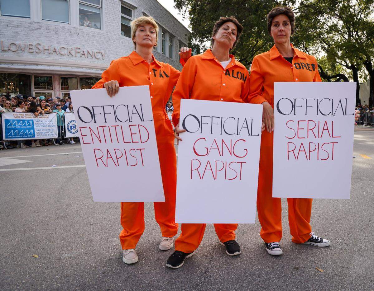 The Alexander brothers are satirized as the vibrant and quirky 41st Annual King Mango Strut Parade made its way through the Grove.