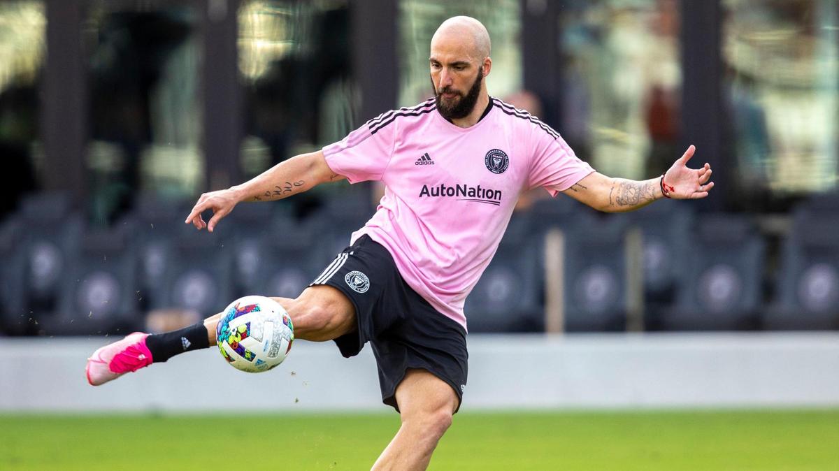 Inter Miami CF forward Gonzalo Higuain strikes the ball during drills for an open training session at DRV PNK Stadium in Fort Lauderdale, Florida, on Saturday, February 5, 2022.