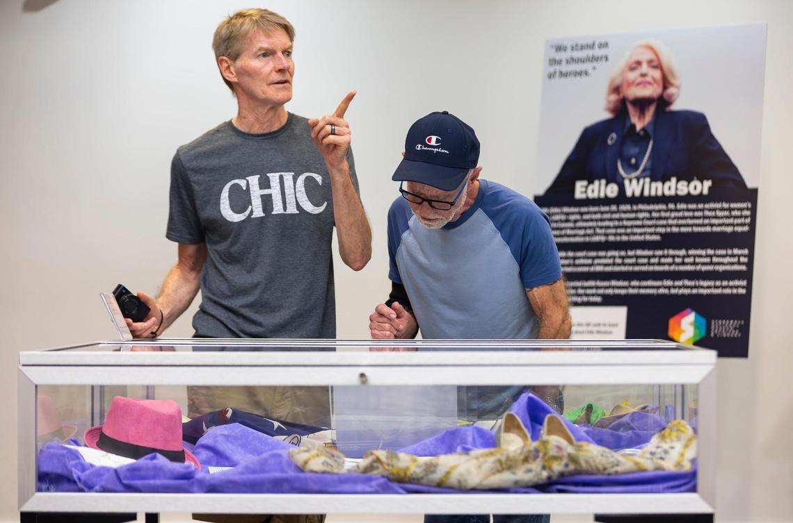 Kevin Gallagher, a tourist from Seattle, left, and Ricardo Fernandez visit the Stonewall National Museum, Archives and Library on Tuesday, Feb. 25, 2025, in Fort Lauderdale, Fla.