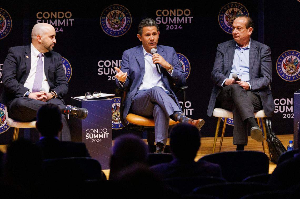 Florida Senator Jason Pizzo, center, coordinates a discussion in an “Economic Impact, Market Matters” session between Jonathan Alfonso, left, Stevan Pardo, right, and other panelists during the Condo Summit 2024 on Dec. 3, 2024, at the Liberal Arts Building at Florida Atlantic University in Davie.
