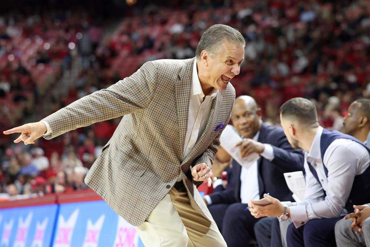 Nov 25, 2024; Fayetteville, Arkansas, USA; Arkansas Razorbacks head coach John Calipari reacts toward the bench during the second half against the Maryland Eastern Shore Hawks at Bud Walton Arena. Arkansas won 109-35. Mandatory Credit: Nelson Chenault-Imagn Images