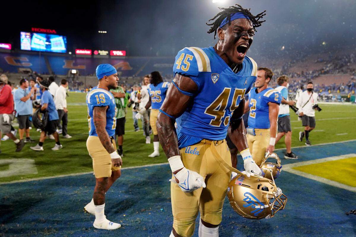 UCLA linebacker Mitchell Agude (45) celebrates the team’s win over LSU in an NCAA college football game Saturday, Sept. 4, 2021, in Pasadena, Calif.