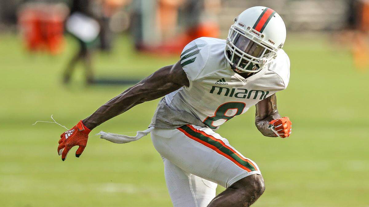 Miami Hurricanes cornerback DJ Ivey (8) runs drills during practice at the University of Miamis Greentree Field in Coral Gables on Thursday, August 12, 2021.