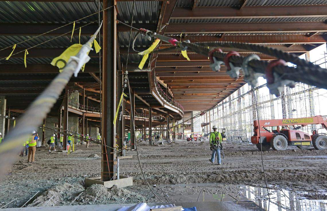 Workers continue the renovation work at the Miami Beach Convention Center on Tuesday, Aug. 8, 2017. The construction is scheduled to be completed by the end of 2018.