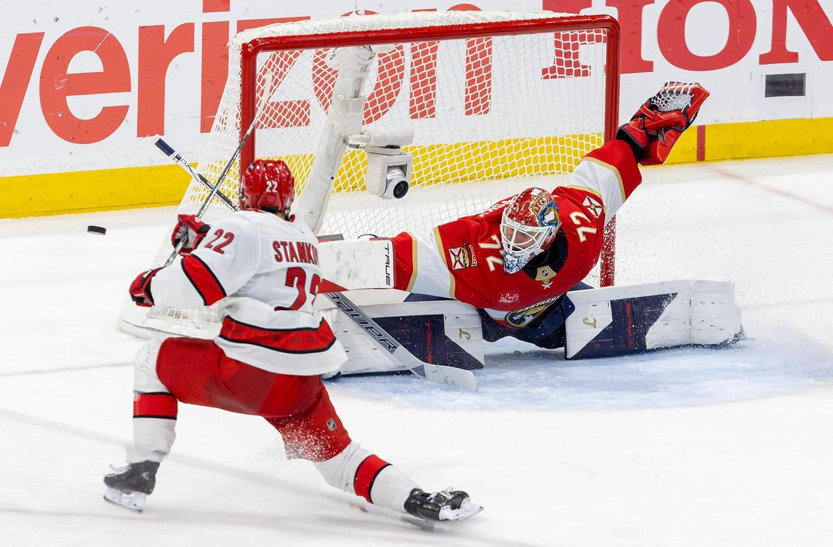 Florida Panthers goaltender Sergei Bobrovsky (72) stops a shot by Carolina Hurricanes center Logan Stankoven (22) during the second period of Game 3 in the Eastern Conference Final of the NHL Stanley Cup Playoffs at Amerant Bank Arena on Saturday, May 24, 2025, in Sunrise, Fla.