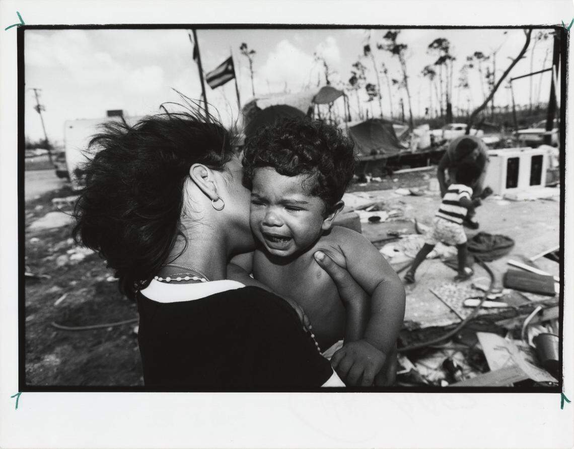 Jessica Santiago holds Edwardo Vega Jr., then 11 months, who was crying after being given a shot by nurses, near the grounds of Dixie Trailer Park in South Miami-Dade after Hurricane Andrew struck the area.