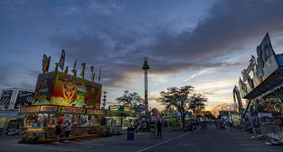 Guests make their way through the fairgrounds during the opening day of the 74th annual Miami-Dade County Youth Fair on Thursday, March 12, 2026, in Miami, Fla.